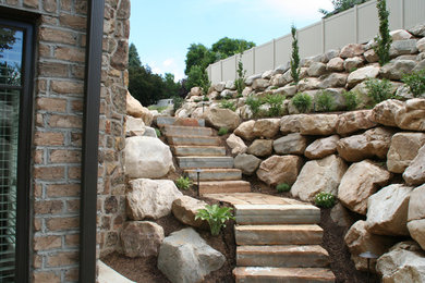 This is an example of a large full sun side yard landscaping in Salt Lake City.