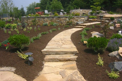 Inspiration for a large back full sun garden in Philadelphia with a garden path and natural stone paving.