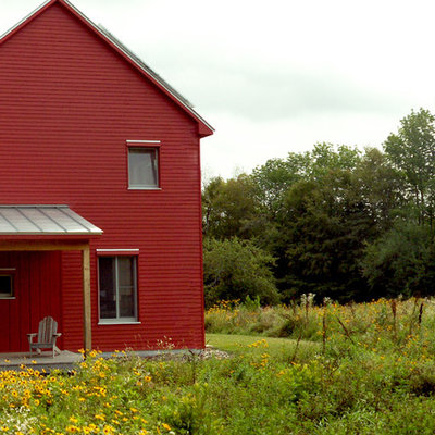 Design ideas for a huge farmhouse front yard landscaping in Portland Maine.