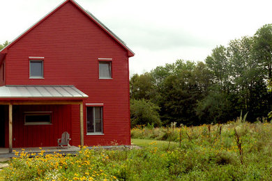 Expansive farmhouse front garden in Portland Maine.