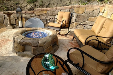 Patio - rustic patio idea in Portland Maine with a fire pit and decking