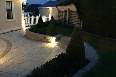 Design ideas for a small traditional back formal full sun garden for summer in Other with a garden path and concrete paving.