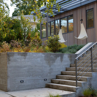 This is an example of a contemporary retaining wall landscape in Boston.