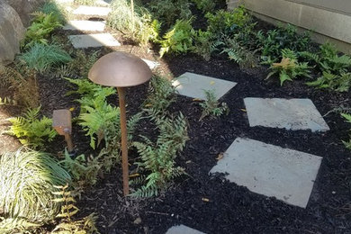 Inspiration for a large traditional full sun backyard mulch formal garden in Philadelphia for summer.