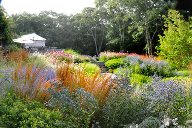 Inspiration for a large rustic full sun backyard garden path in New York.