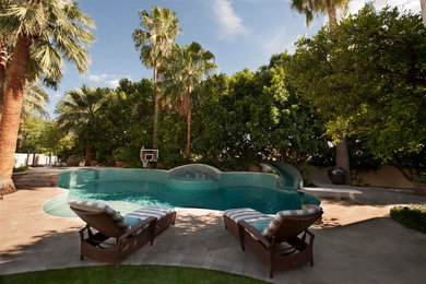 Pool - mediterranean backyard pool idea in Phoenix