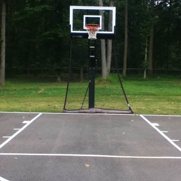 Mirza B's Pro Dunk Gold Basketball System on a 42x50 in Monmouth Junction, NJ