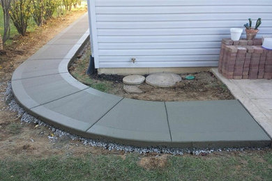 Design ideas for a small concrete paver garden path in St Louis.