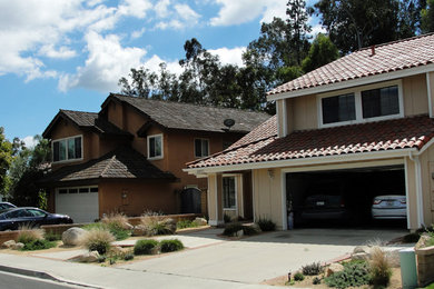 Design ideas for a mid-sized mediterranean drought-tolerant and shade front yard concrete paver garden path in Orange County for summer.