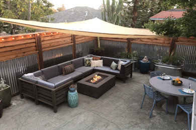 Inspiration for a mid-sized industrial backyard gravel patio remodel in San Francisco