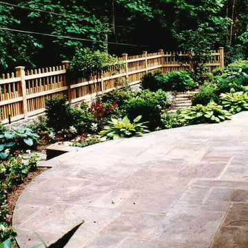 Modern Picket Fence and Flagstone Patio