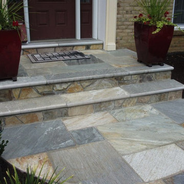 Mortared Patterned Stone Entryway w Curved Landing