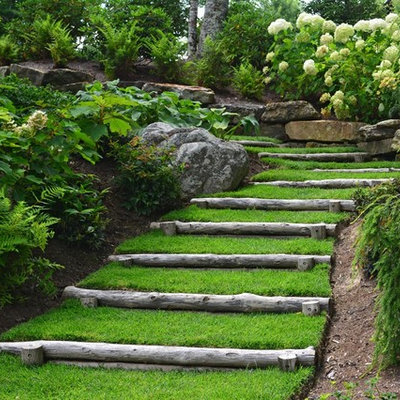 Design ideas for a large traditional partial sun hillside garden path in Other.