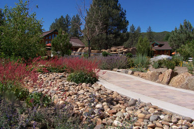Design ideas for a large rustic full sun concrete paver garden path in Other for summer.