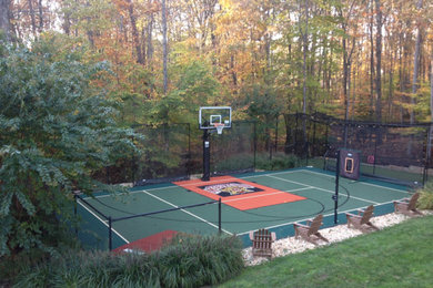 Design ideas for a huge farmhouse partial sun backyard concrete paver outdoor sport court in DC Metro for summer.