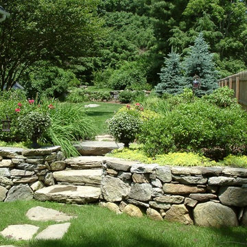 Natural stone path leads to front door