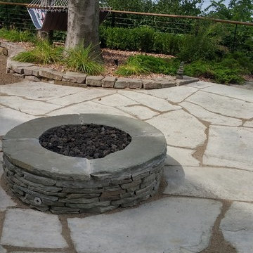 Natural Stone patio and custom fire pit