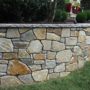 Natural Stone Retaining Walls w Flagstone Capping