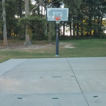 Naveed U's Pro Dunk Gold Basketball System on a 26x35 in Monroe, NC