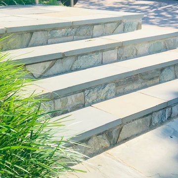 New Driveway with retaining wall and walkway with steps with landings - Stunning
