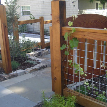 new hogwire and redwood fence
