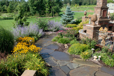 Photo of a large transitional stone water fountain landscape in Cleveland.