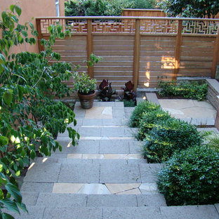 Inspiration for a small contemporary hillside stone landscaping in San Francisco.