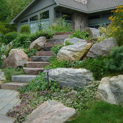 This is an example of a traditional hillside stone landscaping in Other.