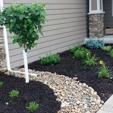 75 River Rock Landscaping Ideas You Ll, Landscape Ideas With River Rock And Mulch