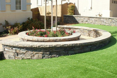 Inspiration for a large full sun front yard stone landscaping in San Francisco.