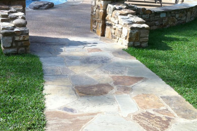 Design ideas for a large full sun backyard stone garden path in Other.