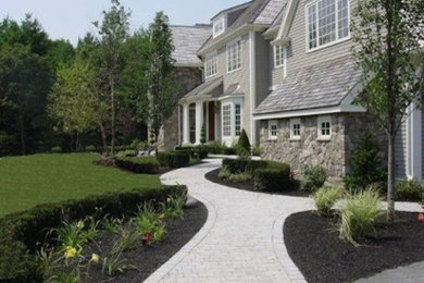 Inspiration for a large full sun front yard landscaping in Boston.