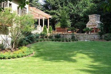 Foto de jardín grande con exposición total al sol y adoquines de piedra natural