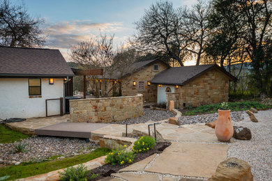 Design ideas for a large rustic drought-tolerant front yard stone garden path in Austin.