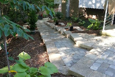 Inspiration for a large side fully shaded garden in Cincinnati with a garden path and brick paving.