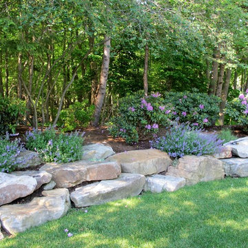 OUTCROPPING WALL AND PLANTINGS