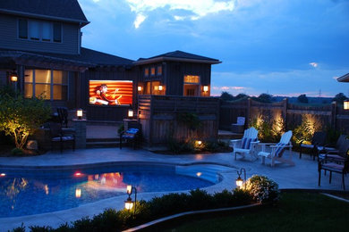 Design ideas for a huge traditional full sun backyard landscaping in Toronto for summer.