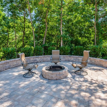 Outdoor fire-pit, seated walls, and large patio space for parties