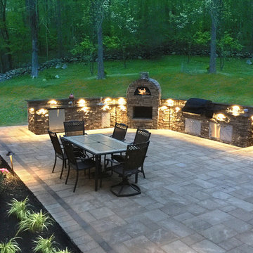 Outdoor Kitchen with Pizza Oven on Large Lighted Patio