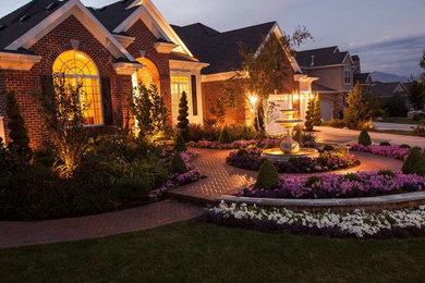 Inspiration for a huge traditional front yard landscaping in Salt Lake City.