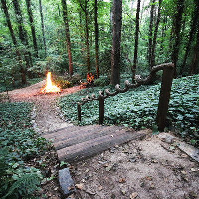 This is an example of an eclectic shade hillside landscaping in Atlanta.
