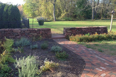 Inspiration for a craftsman brick landscaping in Bridgeport.