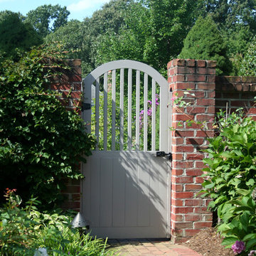 Painted Wood Garden Gate with Brick Wall