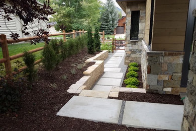Design ideas for a large modern side yard concrete paver landscaping in Salt Lake City.