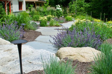 Inspiration for a huge contemporary drought-tolerant front yard landscaping in Providence.