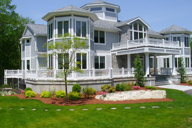 Inspiration for a huge traditional full sun front yard landscaping in Boston.