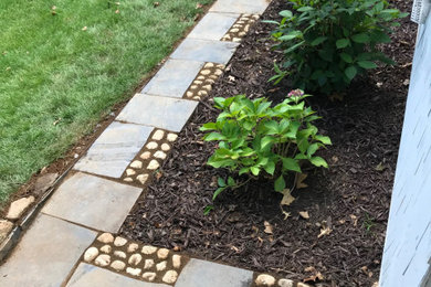 Design ideas for a small rustic partial sun side yard stone garden path in New York.
