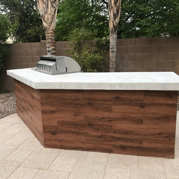 Patio and Modern BBQ Island with stainless grill and side burner