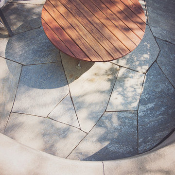 Patio seating and COR-TEN Steel Fire Bowl with an Ipe Cover