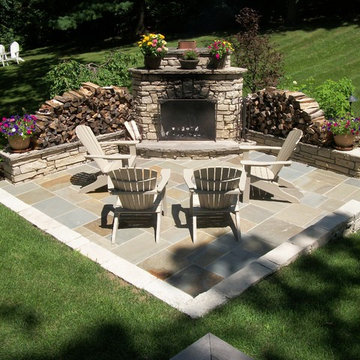 Patio with stone fireplace